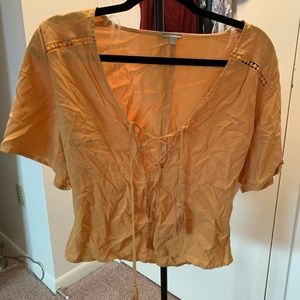 Gold colored crop top